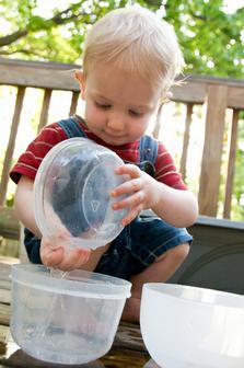 Toddler Playing with Water