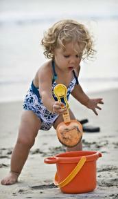 Toddler with bucket and spade